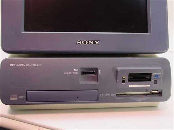 Sony UPA-PC105 DPF System Controller close-up of front panel showing DPF System Controller label, Memory Stick slot, CD drive, and floppy disk drive