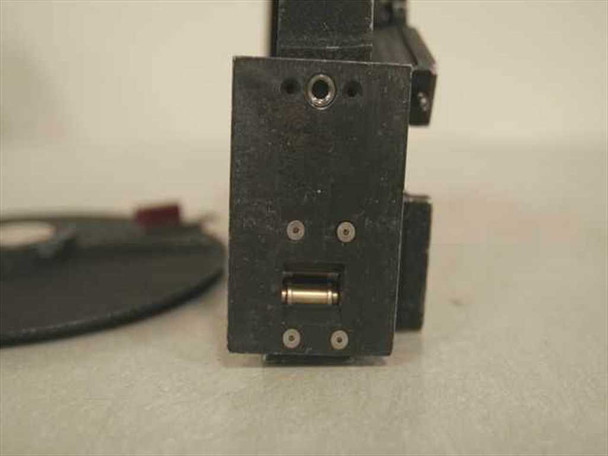 VDR-MII film camera reel side detail showing film gate/transport block with small roller and mounting screw holes