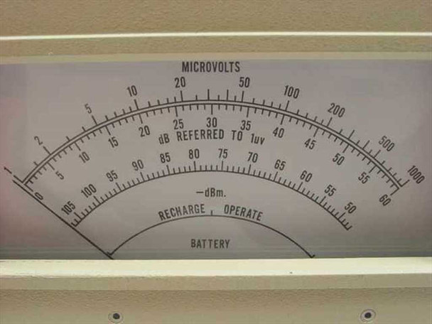 Carnel Labs NM-65T – close-up of front analog panel meter face showing Microvolts scale (1–1000), dB referred to 1uV, -dBm, and Battery Recharge/Operate indicator arc