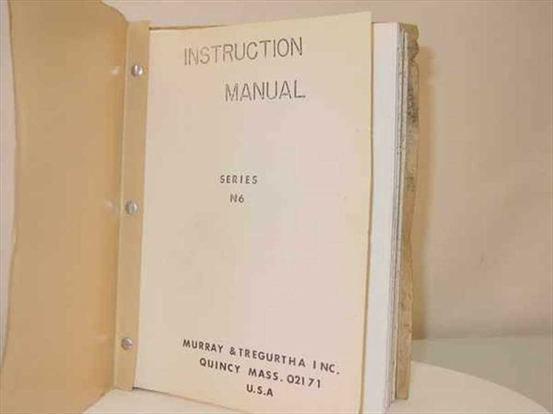 Murray & Tregurtha Harbormaster Series N6 Instruction Manual open binder showing interior pages and binding