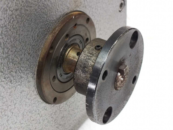 Sandex 10FN Oscillating Parts Handler – close-up of side output flange and shaft showing wear and surface oxidation