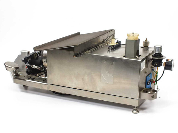 Micro Tooling MT0268 pneumatic bearing assembly machine – left-rear three-quarter view showing underside frame, pneumatic fittings, and stainless steel base with adjustable feet