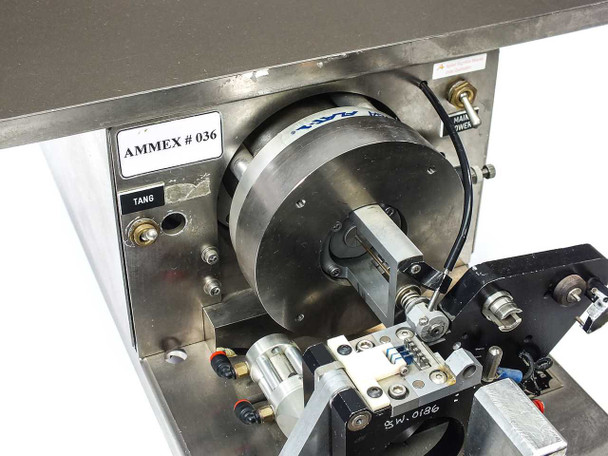 Micro Tooling MT0268 close-up of rotary chuck disc and pneumatic bearing feed actuator sub-assembly with AMMEX 036 label visible