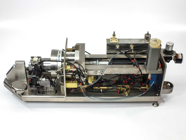 Micro Tooling MT0268 top-open view showing internal pneumatic circuit with DC motor drive, multiple Bimba flat-1 cylinders, manifold blocks, pneumatic tubing, and wiring