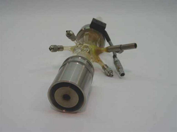 TMA quartz sample holder assembly — top-down angled view showing tube fittings arrangement, wire lead connections, and stainless cylindrical base piston