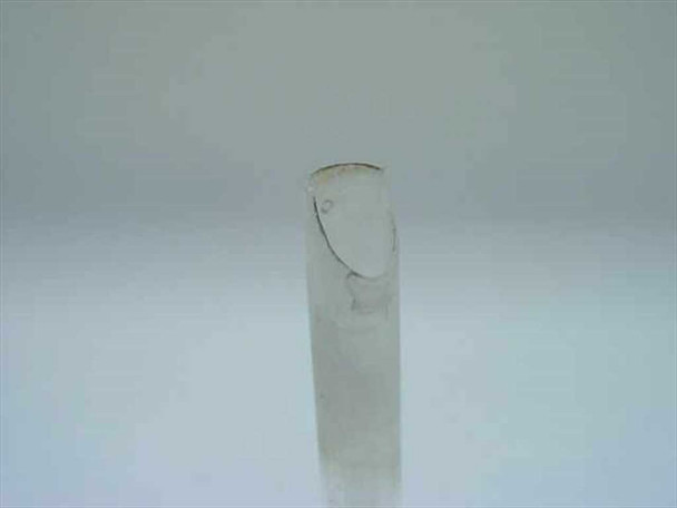Close-up of chipped top edge of TMA quartz sample column showing chip and crack at the open end of the tube