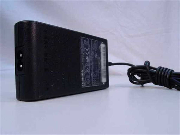 Toshiba PA3083U-1ACA AC adapter side view showing Toshiba branding label and rating plate