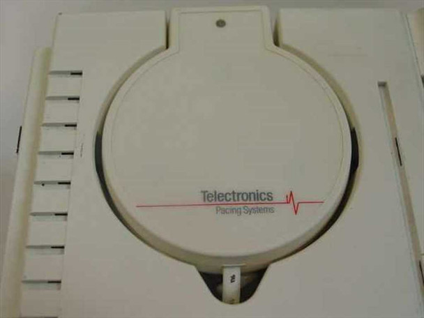 Telectronics Pacing Systems logo and circular pacemaker programmer wand receptacle on top surface of the 9602