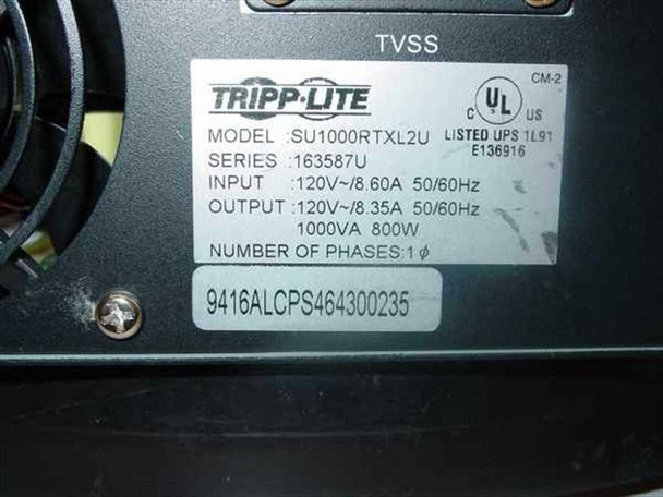 Tripp Lite SU1000RTXL2U rating label showing model SU1000RTXL2U, series 163587U, 120V input 8.60A, 120V output 8.35A, 1000VA 800W, single phase