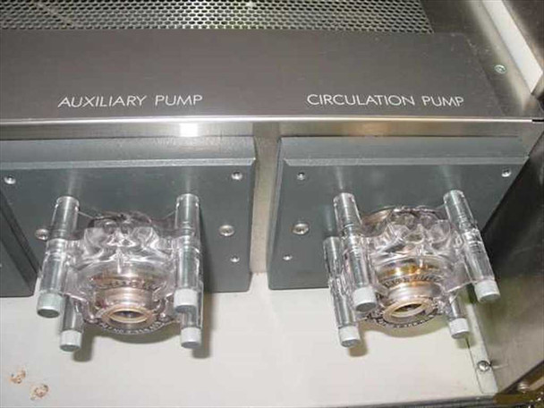 CRBS Opticell 5200R Auxiliary Pump and Circulation Pump peristaltic pump heads — close-up showing clear pump head housings