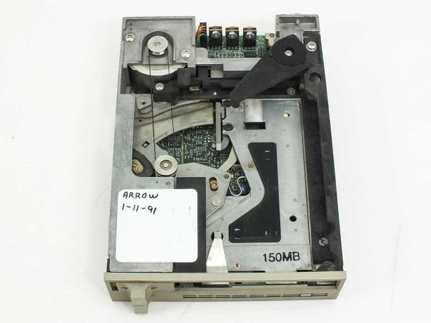 Archive 2150L tape drive – front top-down view showing internal mechanism, tape head arm, rollers, and bezel with 150MB label; Arrow inventory tag dated 1-11-91 visible