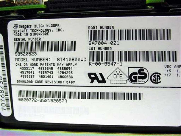 Seagate ST410800WD label closeup showing model number, part number 9A7004-021, serial number, lot number, and download code revision 0407