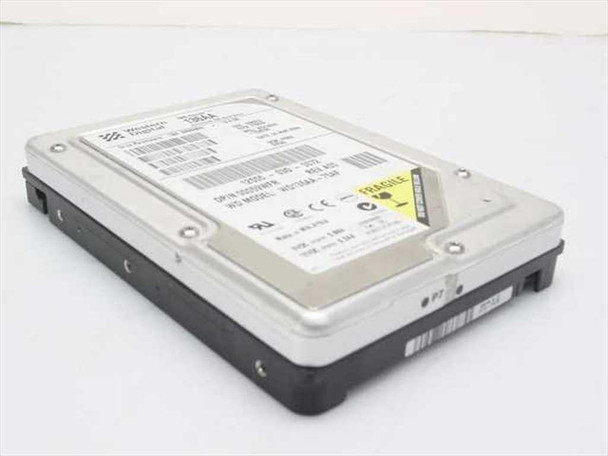 Western Digital WD Caviar 13.6GB IDE hard drive — angled side view showing top label and FRAGILE sticker