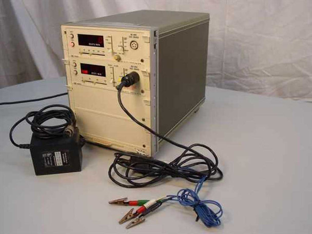 HP 78901A Patient Bedside Monitor front-right view with 78203C and 78302C modules, 3-lead wire and AC adapter visible on bench