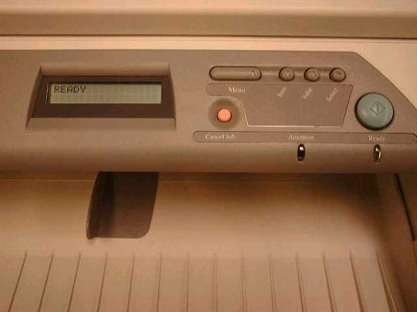HP 2500CM printer front control panel close-up showing LCD display reading READY, Menu button, Cancel Job, Attention, and Ready indicator lights