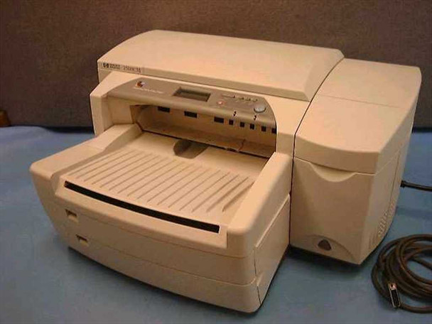 HP C2685A 2500CM Professional Series Color Printer — front three-quarter view showing output tray extended and parallel cable attached