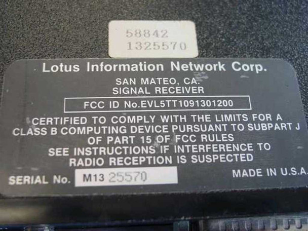 Lotus Information Network Corp. model label showing manufacturer name, San Mateo CA, Signal Receiver designation, FCC ID EVL5TT1091301200, and serial number M13 25570