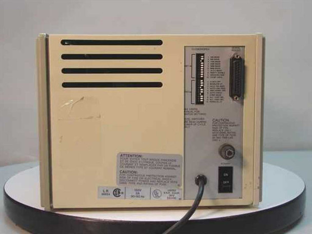 DH Print 546 Cypher IV thermal label printer – rear panel showing ventilation slots, DIP switch bank, RS-232C serial connector, and power switch