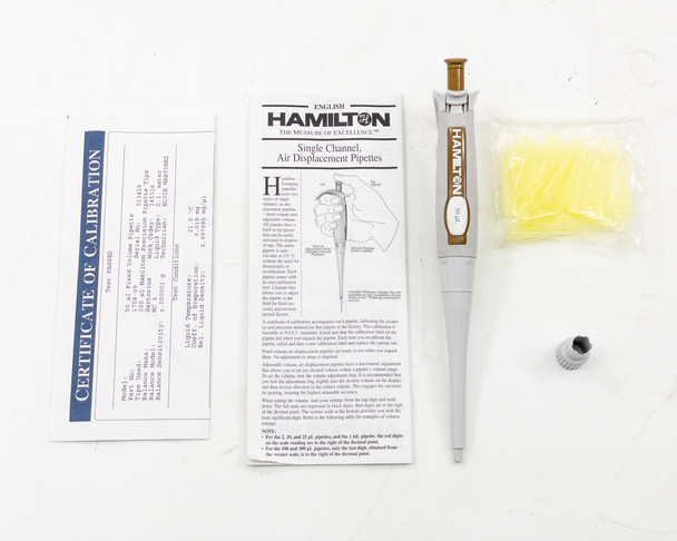 Hamilton 55019-07 SoftGrip 50µL fixed volume pipette complete kit — pipette, calibration certificate, manual, calibration tool, and bag of Fisherbrand pipette tips laid out on white background
