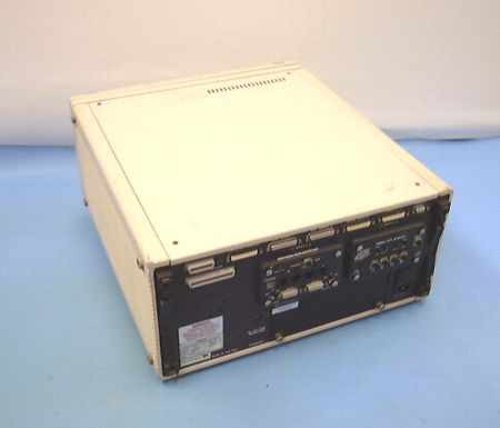 Tekelec TE713 Chameleon 32 rear panel overview showing I/O module bays and connector array