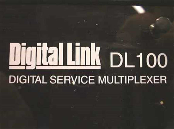 Digital Link DL100 front panel nameplate close-up showing Digital Link DL100 Digital Service Multiplexer branding