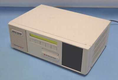 Micom 5000 5K Marathon Network Node front panel with green LCD status display and 5000VM/2 modem badge — three-quarter view