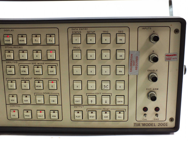 Kode TIA Model 2001 right-side keypad close-up showing Data Entry, Trig, Seg, Inputs BNC connectors, Enable, Ext Arm, Cal, and GND, with Nyoptic calibration label