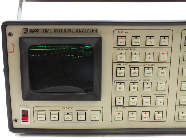 Kode TIA Model 2001 close-up of CRT display showing green trace with Display, Store/Recall, Analysis, and Readout Mode key sections