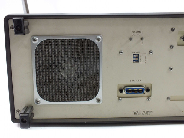 Kode TIA Model 2001 rear panel close-up — left section showing cooling fan grille, 10 MHz output, On/Off DIP switches, and IEEE-488 GPIB connector