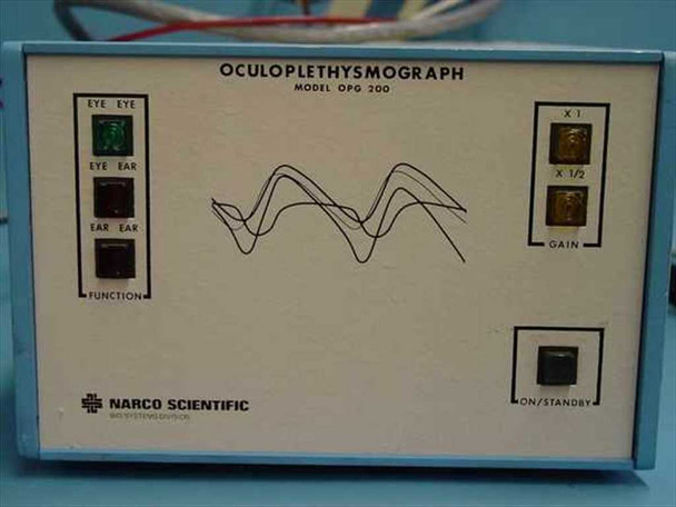 Narco Scientific OPG 200 front panel showing OCULOPLETHYSMOGRAPH label, function selector buttons (Eye-Eye, Eye-Ear, Ear-Ear), gain switches (X1, X1/2), and ON/STANDBY button