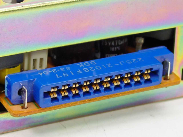 IBM 5641249 power supply — close-up of blue DDK multi-pin output connector, marked 225J-21028F197, date code 83-2-04