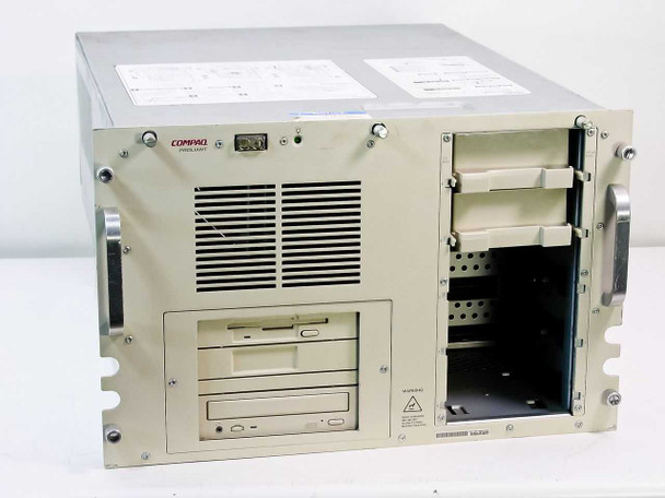 Compaq ProLiant 2000 Series 3130 Tower Server — front right angle view showing floppy, CD-ROM, and empty SCSI drive bays