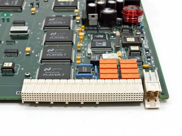 Cabletron 9F206-02 FDDI blade — PCB detail showing National Semiconductor DP83257VF PLAYER+ ICs, backplane edge connector, and orange capacitor bank