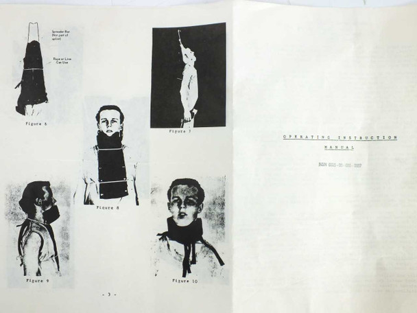 Original operating instruction manual open to figure pages showing splint application diagrams for cervical and limb immobilization