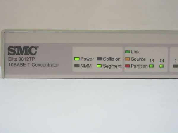 SMC Elite 3812TP front panel label close-up showing model name, Power, Collision, NMM, Source, Segment, Partition, and Link LED indicators