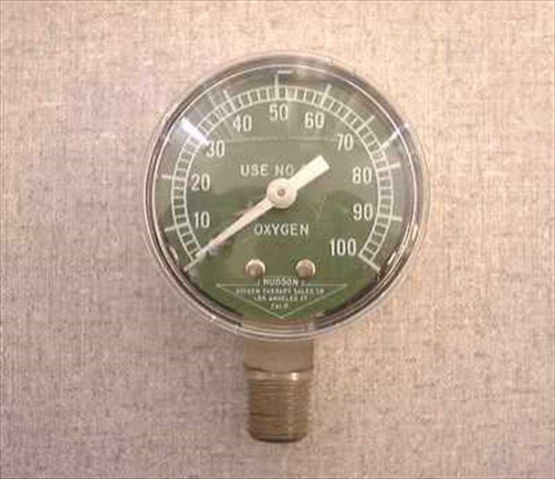 Hudson Oxygen Therapy Sales Co. O2 pressure gauge, 2.25-inch green dial face reading 0-100 PSI, with brass threaded bottom fitting — front face view