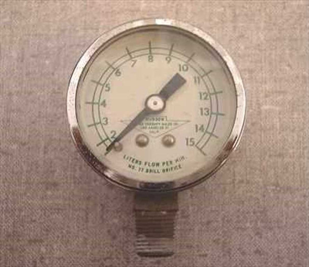 Hudson Oxygen Therapy Sales Co. gas flow gauge, 15 LPM max, 1.75-inch face, No. 17 drill orifice — front dial view showing liters-per-minute scale and threaded bottom fitting