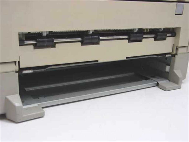 Sun QA-6 SPARCprinter paper output tray area — front lower section open showing paper feed path and roller assembly