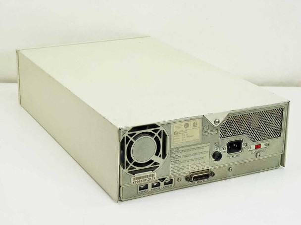 HP 7963B rear panel view showing HP-IB connector, address switches, AC line inlet, line select switch, and cooling fan