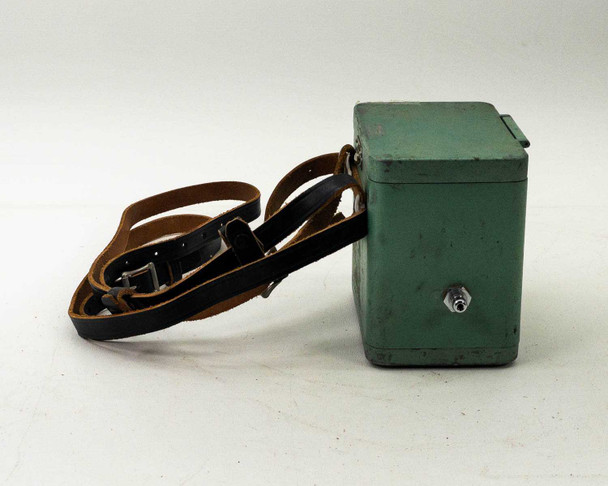 MSA Model 20 Combustible Gas Indicator — opposite side view showing green painted metal case with leather strap and port fitting
