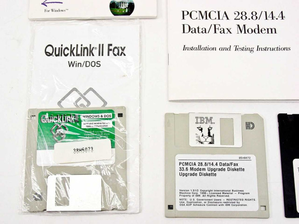 QuickLink II Fax Win/DOS software floppy disk in original bag alongside IBM PCMCIA 28.8/14.4 33.6 Modem Upgrade Diskette and installation manual