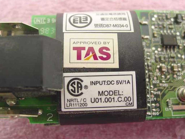 Apple Ambit U01.001.C.00 modem card – close-up of CSA rating label showing INPUT DC 5V/1A, model U01.001.C.00, TAS approval mark, and BSMI certification D87-M034-0