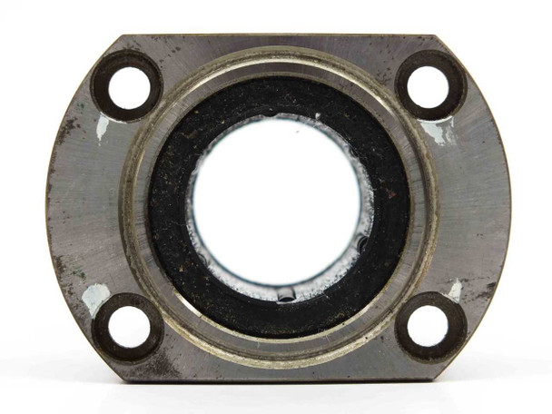 NB SMT25GUU Flange Slide Bush — rear flange face showing four mounting holes and bore opening