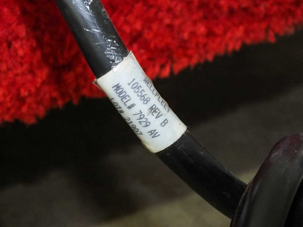Wellfleet power cable strain-relief label showing Part 105568 Rev B, Model 7929 AV