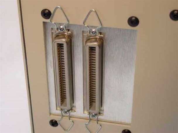 ADIC VLS-8MM rear panel showing two 68-pin SCSI connectors with bail-latch hardware