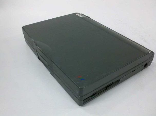 Acer 750C Note Laptop closed top-down view showing dark grey clamshell body with floppy drive bay