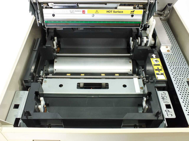 Tektronix Phaser IIsd 4684 interior view showing transfer roll and paper path with open cover – asset tag visible on right side panel