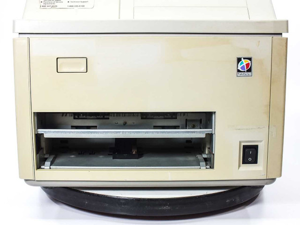 Tektronix Phaser IIsd 4684 front view showing paper output tray open and Tektronix logo badge – slight yellowing visible on left side panel
