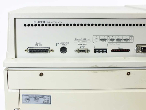 Tektronix Phaser IIsd Model 4684 rear panel close-up – Serial RS-232, LocalTalk Input, Ethernet port with address DIP switches, and Status indicator LEDs