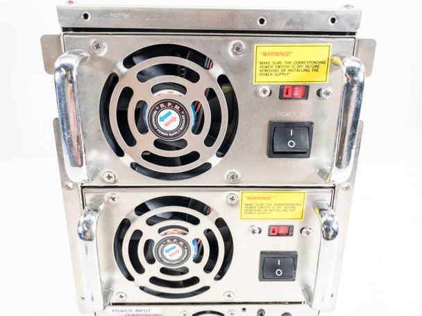 Topower TOP-RS1A dual PSU – rear view of both modules showing individual power switches, fault indicators, and power input section